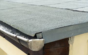repair or replace Tylwch flat roofing?